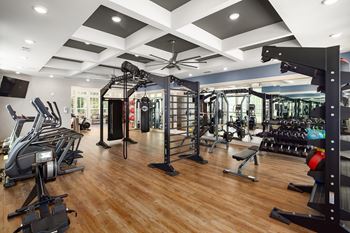 24-Hour fitness center with yoga room